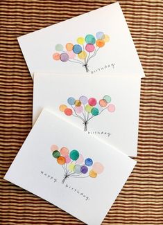 three cards with balloons on them and the words happy birthday written in cursive writing