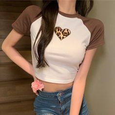 This is perfect for those who are looking for a clothing for a good price. It is fashionable, stylish, and it will look great on anyone who wears it. Do you wanahavit? Cute White Patchwork Top, Cute Crew Neck Tops With Patchwork, Fitted Casual Patchwork Crop Top, Casual Fitted Patchwork Crop Top, Casual Patchwork Crop Top, Fitted Cotton Patchwork Crop Top, Cute Short Sleeve Patchwork Tops, Leopard Embroidery, Fashion Crop Tops