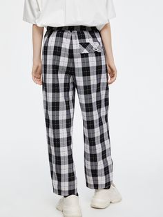 Details: Plaid wide leg pants with elasticized waistband Classic black and white plaid with clean color scheme Relaxed straight leg pants with high waistline Elasticized waistband for comfort Materials & Care: 83.5% polyester, 15.2% viscose, 1.3% spandex Hand wash | Dry clean Do not bleach Size & Fit: Model is 5'7", Bust 32, Waist 24, Hips 35, wearing a size S Item #: JL3PA05 Relaxed Fit Plaid Pants With Elastic Waistband, Plaid Straight Pants With Relaxed Fit, Plaid Relaxed Fit Straight Pants, Relaxed Fit Plaid Straight Pants, Plaid Wide Leg Pants, Black And White Plaid, Pantalon Large, Plaid Pants, Chic Me