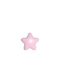 a pink star shaped object on a white background