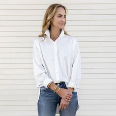 Basic white blouse in the front, not so basic in the back with a adorable embellishment! Pop the collar and have some fun with this oversized shirt. One size fits most (sizes 4-12) Amazing cotton poplin! 97% Cotton 3%Spandex Cool wash, low temp dry, warm iron. Do not iron embellishment. Trendy Everyday Shirt With Shirttail Hem, Trendy Collared Shirt For Everyday, White Collared Blouse For Day Out, Trendy Shirt With Shirttail Hem For Daywear, Everyday White Shirt For Fall, Trendy Shirttail Hem Tops For Daywear, White Blouse With Rolled Sleeves For Work, White Blouse With Rolled Sleeves For Day Out, Versatile White Blouse For Day Out