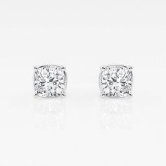 There's nothing more versatile than a pair of classic stud earrings. We love these princess cut lab grown diamond studs for every occasion. Pick the size and color best suited to your ears in the color of gold that you fancy. Luxury Diamond Earrings With Cushion Cut And Accents, Classic Cushion Cut Cubic Zirconia Diamond Earrings, Cushion Cut Diamond Earrings For Anniversary, Elegant Cushion Cut Diamond Earrings With Brilliant Finish, White Diamond Earrings With Diamond Accents In Asscher Cut, Wedding Cushion Cut Diamond Earrings, White Diamond Earrings With Asscher Cut And Accents, Formal Diamond Earrings With Cushion Cut And Diamond Accents, Cushion Cut Diamond Earrings For Wedding