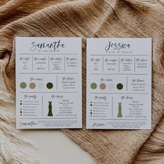 two wedding seating cards on top of a blanket