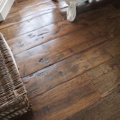 a wooden floor with a basket on it