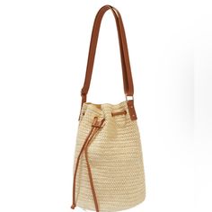 This Bucket Bag Will Be Your New Favorite Summer Staple. Features An Adjustable Vegan Leather Strap And An Adjustable Front Closure. Includes One Interior Pocket With Gold Hardware. Size 12.5" X 9" X 9" Material Details Shell: 100% Paper Lining: 100% Polyester Retails For $78 Snag This Stylish And Practical Bag Here For A Fraction Of The Price. Beige Bucket Bag With Braided Handles, Beige Pouch Straw Bag With Adjustable Strap, Versatile Beige Satchel Straw Bag, Summer Beige Hobo Bag With Adjustable Strap, Beige Summer Hobo Bag With Adjustable Strap, Versatile Beige Bucket Bag For Vacation, Light Brown Vacation Bag With Adjustable Strap, Vacation Light Brown Shoulder Bag With Adjustable Strap, Chic Sand Shoulder Bag For Travel