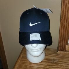 Navy Blue Nike Hat With Strap Brand New Never Used Or Worn With Tags Retails For $30.00 Casual Blue Golf Hat, Classic Blue Sports Hat, Blue Sports Hat With Short Brim, Blue Short Brim Sports Hat, Blue Baseball Cap For Spring Sports, Blue Spring Baseball Cap For Sports, Classic Blue Baseball Cap For Spring, Unc Logo, Nike Golf Hat