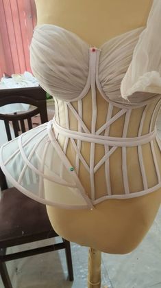 a mannequin is shown with white bras