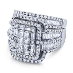 a diamond ring set with three rows of diamonds on top of each one, and two sides