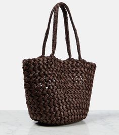 Estelle raffia tote bag in brown - The Row | Mytheresa Elegant Brown Straw Bag With Double Handle, Brown Luxury Woven Shoulder Bag, Luxury Brown Woven Shoulder Bag, Luxury Brown Woven Bag, Luxury Woven Bag With Double Handles, Luxury Woven Bucket Bag With Double Handles, Luxury Brown Bags For Vacation, Luxury Brown Straw Tote Bag, Elegant Brown Woven Shoulder Bag