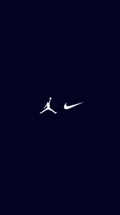 the silhouette of a person jumping up in the air with a nike logo on it