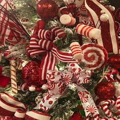 a christmas tree decorated with candy canes and ornaments