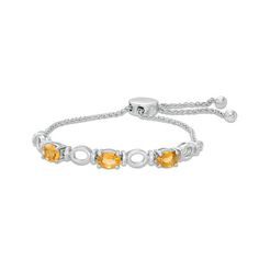 A great anytime choice, this gemstone bolo bracelet is sure to become an instant favorite. Crafted in sterling silver, this casual style features a trio of 7.0 x 5.0mm oval-shaped honey yellow citrines alternating with fancy open oval links. She can wear one, two or more bolo bracelet designs together to produce a look all her own. Buffed to a brilliant luster, this easy-on wheat chain bolo adjusts up to 9.5 inches and secures with a bolo clasp. Adjustable Oval Fine Jewelry Bracelet, Honey Yellow, Bolo Bracelet, Peoples Jewellers, Citrine Stone, Yellow Stone, November Birthstone, Oval Stone, Gemstone Bracelets