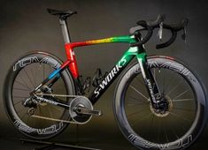 the bike is painted with different colors on it's front and rear wheel rims