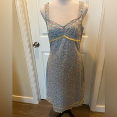 Beautiful, Nwt Vintage Betsey Dress. Stretch Cotton, Comfortable, Beautiful Dress. Yellow Ribbon Detail. Hidden Zipper In Back. Size L, A-Line. Blue Fitted Sundress For Garden Party, Fitted Blue Sundress For Garden Party, Vintage Betsey Johnson, Dress Stretch, Betsey Johnson Dresses, Yellow Ribbon, Dress Yellow, Dresses Vintage, Beautiful Dress