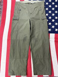 For Sale is a Pair of original german Army trousers, Dating from roughly the 1960s Excellent styling on these - wide baggy cut, higher rise,  with unusual pockets and button up side ones. Feel to be a 100% cotton. Tagged size isnt present but measure a 38'' Waist, with a 30.5'' inside leg For more accurate measurements, Like seat, top thigh, front rise etc - Please take a look at photos.  Good vintage condition with no serious signs of past wear - subtle darker mark on one leg, as shown. Cant re Dark Mark, German Army, 1960s, Wide Leg, Favorite Outfit, Trousers, Take That, Bathing Beauties, Electronic Accessories