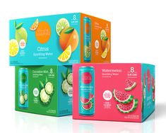 three different flavors of watermelon, cucumber and orange juice in boxes