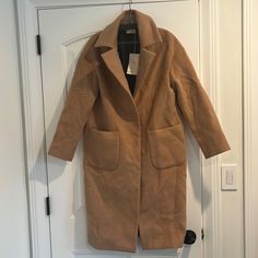 Brand New With Tag Coat. Size Xs. Questions? Please Comment Camel Long Coat With Pockets, Oversized Camel Winter Outerwear, Chic Camel Outerwear With Pockets, Camel Long Coat For Spring, Spring Camel Long Coat, Long Camel Coat For Spring, Camel Winter Outerwear With Pockets, Casual Long Camel Coat, Spring Camel Outerwear With Pockets