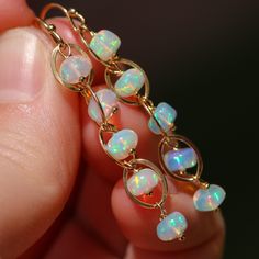 Ethiopian Opal Earrings Welo Opal Earrings Fire Opal Earrings Genuine Opal Dangle Earrings 14K Opal Gold Chain Earrings Small Opal Earrings (24172 - 3) Fusion Style Wire Wrapped Drop Earrings, Hypoallergenic Opal Dangle Jewelry, 14k Gold Filled Dangle Jewelry For Parties, Gold Opal Hoop Jewelry, Gold Hoop Opal Jewelry, Handmade Opal Drop Earrings, Gold Hypoallergenic Opal Jewelry, Hypoallergenic Gold Opal Jewelry, Gold Opal Drop Earrings