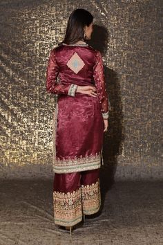 Wine red kurta with dori, thread and zari embroidered geometric and floral motifs embellished with sequin and mirrorwork. Comes with matching palazzo and scalloped border dupatta. - Aza Fashions Elegant Red Kurta With Zari Work, Festive Saree Set With Dabka Details, Traditional Red Sets With Dabka Detailing, Red Chanderi Palazzo Set With Dabka Detail, Designer Red Set With Dupatta, Elegant Festive Choli With Dabka, Elegant Burgundy Dupatta With Zari Work, Burgundy Traditional Wear With Dupatta For Festivals, Traditional Burgundy Dupatta For Festive Season