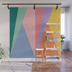 an abstract wall mural with multicolored stripes in a living room or office space