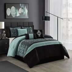 black and teal bedding in a modern bedroom