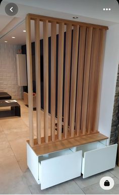 a wooden bench sitting in the middle of a living room