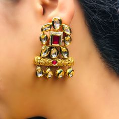 These are a beautiful pair of Earrings, made with beautifully Kundan beaded. These earrings work well with all types of clothing, whether it be formal attire or a casual party. Option 1 : Red Color (E716) Option 2 : Green Color (E717) Eye-catching and unique jewellery that will set you apart. Gift this piece to a loved one, and see their face light up with joy. Best for gifting or for personal use, wear it to any occasion and be in the spotlight. Traditional Drop Clip-on Earrings For Party, Temple Jewelry Beaded Earrings For Parties, Elegant Festive Beaded Chandelier Earrings, Temple Jewelry Chandbali Beaded Earrings, Elegant Chandbali Beaded Earrings, Elegant Beaded Chandbali Earrings, Traditional Jeweled Earrings For Party, Traditional Crystal Earrings For Festive Occasions, Traditional Crystal Earrings For Formal Occasions