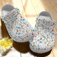 Get your product: Nurse Crocs Classic Clog Whitesole Nurse Cute Pattern Shoes
1. PRODUCT INFORMATION:

Incredibly light and fun to wear.
Water-friendly and buoyant; weighs only ounces.
Ventilation ports add breathability and help shed water and debris.
Easy to clean and quick to dry.
Upper: Croslite.
Lining: Croslite.
Sole: Croslite.
2. SIZE CHART:
3. RETURN:
We will gladly issue you a replacement item or issue a refund back to your original form of payment for any of the following reasons:
You Nursing Crocs, Shoe Crocs, Shoes Birthday Gift, Nurse Clogs, Custom Crocs, Grape Wine, Birthday Gift For Friend, Versatile Shoes, Pattern Shoes