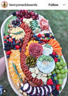 a platter filled with lots of different types of food