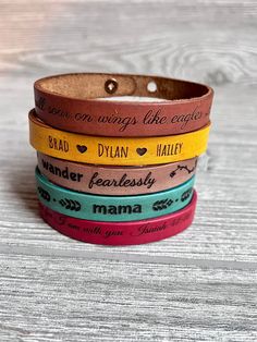 "Simple and fun! This beautiful personalized bracelet can have any engraving you wish for that special gift. Names, birthdays, coordinates, favorite quotes, bible verses. You name it!! Each bracelet is handmade in our shop. Please note each one of these is handmade so no two are exactly alike. Genuine Leather Handmade in the USA Size Height: Top to Bottom is approximately 1/2\" Width: The bracelet is 9\" long overall. Button stud openings are at 7 1/4\" and 8 1/4\" for adjustability. Please veri Women Leather Bracelet, Personalized Brown Leather Bracelet For Everyday, Leather Bracelets For Father's Day, Personalized Engraved Leather Jewelry, Adjustable Stamped Brown Bracelets, Personalized Brown Leather Bracelets, Personalized Adjustable Bracelets For Father's Day, Hand Stamped Bracelets For Father's Day, Personalized Wristband For Father's Day