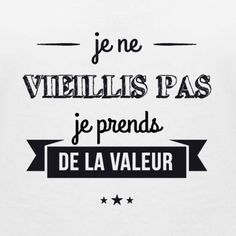 a white t - shirt that says je ne viellis pas jeprends de la valeur