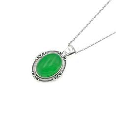 "Charming green jade oval pendant necklace showcases dyed vibrant green white jade and set in dainty oval pendant in silver finish. Vibrant green stone is smooth and highly polished with a rich vivid green color. Sturdy yet lightweight stainless steel cable chain with lobster clasp ensures a secure and comfortable fit. The beautiful design on the back of the pendant is shown in the last photo. Measurements(approx. see 3rd photo) Length:18\" Pendant:1.5x1\"(including bail)" Oval Jade Necklace As Gift, Oval Jade Necklace For Gift, Handmade Jade Pendant Necklace, Adjustable Jade Pendant Necklace, Green Oval Cabochon Necklace Gift, Green Oval Cabochon Necklace For Gift, Oval Jade Cabochon Necklaces, Oval Jade Cabochon Necklace, Green Oval Cabochon Gemstone Necklace