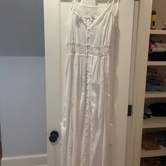 White Linen Maxi Dress. Perfect For Summer! Can Be Worn As A Dress Or Cover Up. Lightweight With Crochet Details And Buttons Down The Front. Never Worn! White Cotton Maxi Dress With Lace Trim, White Lace Trim Sundress Maxi Dress, White Summer Maxi Dress With Lace Trim, White Bohemian Sundress For Daywear, White Lace Trim Maxi Dress For Day Out, Elegant White Sundress With Lace Trim, Chic White Sundress With Lace Trim, Casual White Maxi Dress For Daywear, White Lace Trim Sundress For Vacation