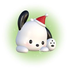 a white and black dog with a red santa hat laying on it's back