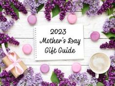 a notepad with the words mother's day gift guide surrounded by purple flowers