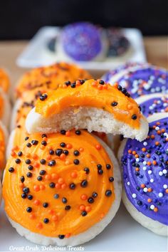 halloween cookies with sprinkles and orange frosting