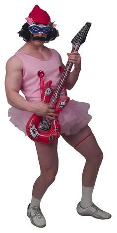 a man in a pink outfit is holding a red guitar and wearing a mask on top of his head