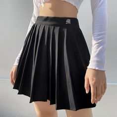 Fitted A-line Tennis Skirt For Spring, Casual A-line Tennis Skirt For Summer, Casual Black A-line Pleated Skirt, Black A-line Pleated Skirt For Summer, Trendy Fitted A-line Skort, Trendy A-line Skort For Summer, Trendy A-line Summer Skort, Casual Fitted A-line Skort, Spring Fitted A-line Tennis Skirt