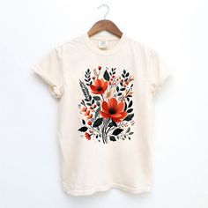 Looking for a cute versatile top to wear? Make sure to grab one of our Graphic tees! This soft and comfortable graphic tee is the perfect top for any outfit. It can be paired with biker shorts, jeans, or even a simple skirt/dress! This tee is true-to-size, so be sure to order your regular t-shirt size! If you are looking for a more oversized look, make sure to size up! Soft-washed Cream Top For Spring, Spring Soft-washed Cream Top, Spring Cream Soft-washed Tops, Spring Cream Soft-washed Top, White Relaxed Fit T-shirt With Watercolor Print, Casual Watercolor Print T-shirt With Relaxed Fit, Casual Cotton T-shirt With Watercolor Print, Spring Organic Cotton Soft-washed Tops, Spring Graphic Tee With Watercolor Print