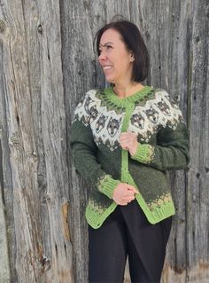 Hand knitted Lettlopi cardigan.  Primary colour - 1407 pine green Green Knitted Winter Cardigan, Winter Green Knitted Cardigan, Green Long Sleeve Sweater With Fair Isle Pattern, Green Long Sleeve Fair Isle Sweater, Green Knitted Cozy Cardigan, Cozy Green Knitted Cardigan, Green Knitted Sweater Coat For Winter, Cozy Green Knitted Outerwear, Nordic Knitted Cardigan For Fall