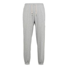 Nike Standard Issue Sports Pants For Men Grey Gray CK6366-063 (Men's/Basketball/Gift to Boyfriend) Athleisure Sportswear Bottoms With Double-needle Hem, Athleisure Bottoms For Sports With Double-needle Hem, Nike Gray Joggers For Gym, Nike Sporty Gray Joggers, Nike Gray Joggers For Sports, Sportswear Sweatpants For Sports Events, Sportswear Joggers For Sports Events And Season, Sportswear Joggers For Sports Season, Sportswear Joggers For Sports Events