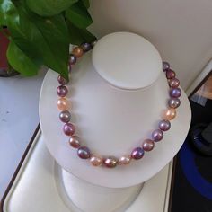 Stunning Edison Baroque multi-colored Pearls Beaded Necklace, 10-13mm, Metallic colors,  Very High Luster.   Lustrous, Colorful and Stunning  Pearl ★ Pearl: Genuine Freshwater Edison Pearl ★ Size: 10-13mm ★ Shape: Baroque ★ Color: Natural untreated, Beautiful Metallic Mauve Purple Colors, Multicolored ★ Luster: Very nice, Wonderful, Very High Luster ★ Surface: Nice, Baby Smooth and Mirror Like, Natural marks, Mostly Very clean ★ Necklace Length: 18inches Accessories ★ Metal: Sterling Silver S925 Colored Pearls, Nice Baby, Edison Pearls, Mauve Purple, Pearl Color, Metallic Colors, Pearl Size, Baroque Pearls, Necklace Length