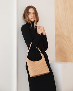 Vogue called it the minimalist, quiet luxury staple for fall, and we agree. With a structured shape and single strap, it’s lightly inspired by the baguette style of the 90s and 00s. Soft, woven leather in a square pattern, like a natural check. Wear it everyday with a cashmere coat and boots for a chic fall uniform, an Chic Business Shoulder Bag With Intrecciato Weave, Designer Business Shoulder Bag With Braided Handles, Chic Business Shoulder Bag With Braided Handles, Designer Shoulder Bag With Braided Handles For Business, Elegant Woven Leather Shoulder Bag For Work, Modern Woven Leather Shoulder Bag For Work, Intrecciato Weave Shoulder Bag For Business, Formal Rectangular Hobo Bag With Braided Handles, Elegant Shoulder Bag With Braided Handles For Work