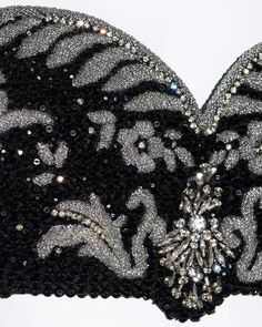 For Sale on 1stDibs - ▪ Gianni Versace silk corset bra ▪ Fully beaded with black and clear beads ▪ Crystal embellishment ▪ Halterneck ▪ Hook fastenings at centre back ▪ IT 42 Elegant Embellished Evening Bodice, Glamorous Embellished Evening Corset, Evening Corset With Sequins And Sweetheart Neckline, Glamorous Embellished Party Bodice, Elegant Black Bodice For Party, Embellished Evening Corset With Fitted Bodice, Embellished Corset With Fitted Bodice For Evening, Elegant Sequined Evening Corset, Elegant Sequined Corset For Evening