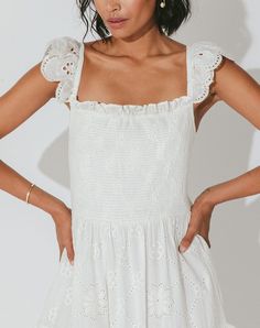 Made of 100% GOTS certified cotton eyelet, the Taryn Midi Dress is fun, frilly, and ready for spring. The ruffle sleeves and tiered skirt with ruffle details make this the perfect piece for any spring day. 100% Organic Cotton Small Length 49" Spring/Summer Fashion March 2023, Closet Space, Tier Skirt, Ruffle Sleeves, Spring Day, Tiered Skirt, Shop Dresses, Dress Brands, Spring Summer Fashion