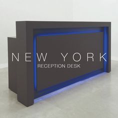 a black and blue counter with the words new york reception desk in front of it