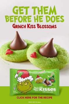 two green cookies with chocolate on top and the words, get them before he does grin kiss blossoms