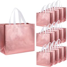 six pink shopping bags with white handles