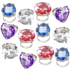 PRICES MAY VARY. GLITZY GOODNESS: Treat those little darlings to a serving of bling! These 1” rings for kids come in an eye-catching assortment of colored plastic jewels with a diamond-like sparkle. Every set includes 12 rings with an adjustable band that fits most kids’ finger. AWESOME COLOR ASSORTMENT: The variety of colors is what really makes these rings a cut above the rest. Every set includes an eye-catching assortment of blue, pink, purple, and clear; perfect for adding pizazz to any outf Plastic Wedding Rings, Princess Rings, Kids Carnival, Colors Dress, Princess Ring, Plastic Ring, Plastic Jewelry, Rings Set, Kids Jewelry