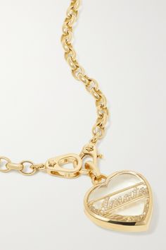 Foundrae's necklace is the perfect gift for a loved one. Handmade from polished 18-karat gold, the heart-shaped pendant is decorated with a diamond-encrusted plate that spells out the Italian word for love and covered with a clear quartz cap. The chunky belcher chain has two clasps at the front, so you can add more charms as you please. Luxury Yellow Gold Diamond Necklace With Heart Charm, Luxury Gold Diamond Necklace For Valentine's Day, Luxury Heart-shaped Diamond Necklace With 17 Jewels, Luxury Gold Diamond Heart Pendant Necklace, Luxury Gold Heart Pendant Diamond Necklace, Diamond Heart Pendant Necklace With Charms, Elegant Yellow Gold Heart Necklace With Charms, Luxury Yellow Gold Heart Pendant Diamond Necklace, Diamond Charm Necklace With Heart Pendant